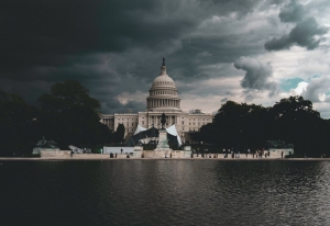 Guns in capitol buildings divide states after armed protests