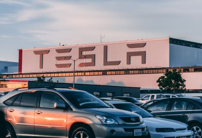 Tesla electric car catches fire after hitting tow truck in Moscow
