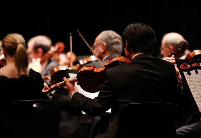 Tattooed, Mexican-American and female: Classical maestra keeps symphony in tune